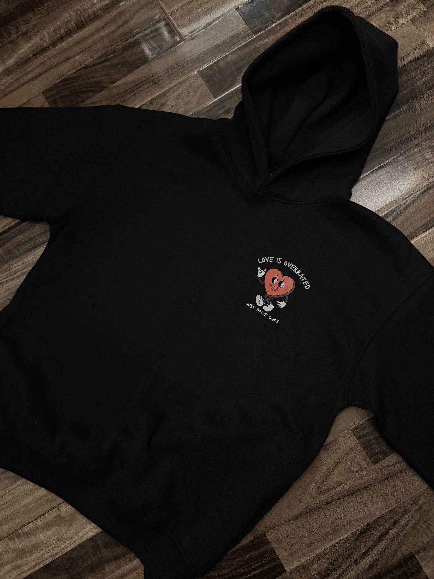 LOVE IS OVERRATED HOODIE